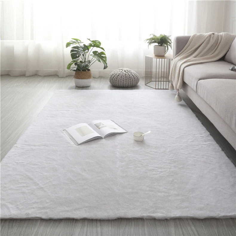 Orange Rabbit Fur Rug Rectangular Open image in slideshow, White soft rabbit fur rug in cozy setting